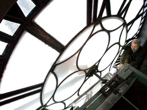 A worker changes the time on the Sailor's Memorial clock in Montreal. It has to be done twice a year.