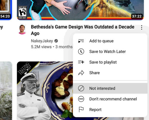 Using the "Not interested" button to tell YouTube what you don't want to see.