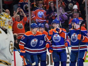 OIlers celebrate a Warren Foegele goal