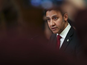 Justice Minister Arif Virani holds a press conference on the new online harms bill on Parliament Hill in Ottawa on Monday, Feb. 26, 2024.