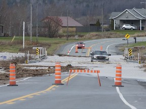 A truck driver makes his way through a flooded road near Beauceville on Nov. 1, 2019.