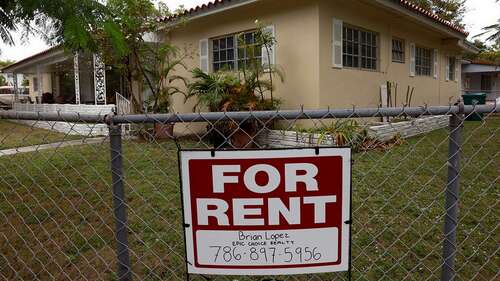 A "for rent" sign on a Miami home