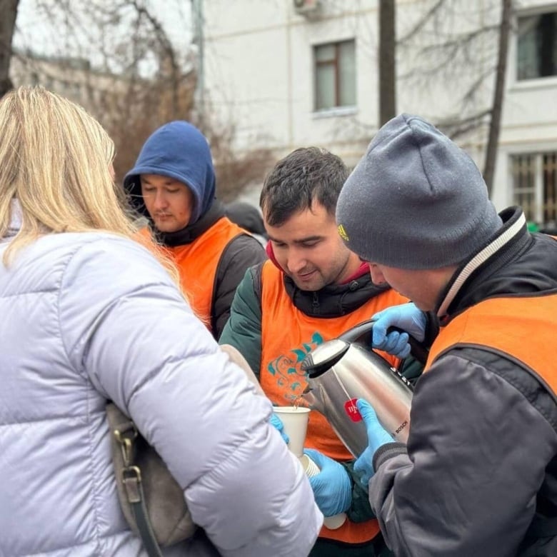 A group of volunteers from Moscow's Tajik community volunteer serving tea at a blood donation clinic on Saturday. After this photo was posted, several racist and hateful comments were posted by users. 