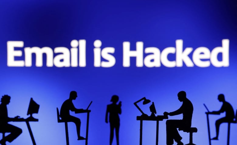 An illustration showed people in black silhouette, seated at desks with laps. At the tops of the illustration is the phrase "Email is hacked."