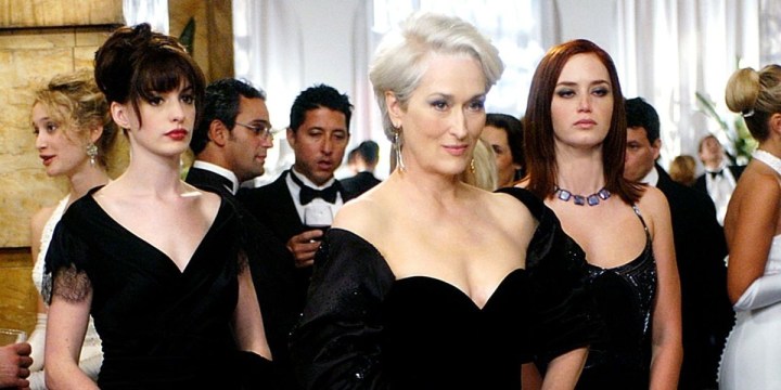 Three women attend a party in The Devil Wears Prada.