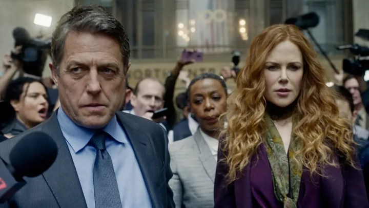 Hugh Grant and Nicole Kidman surrounded by the press in a scene from The Undoing on HBO Max.