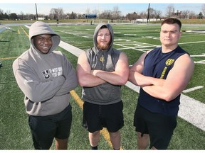 University of Windsor Lancers offensive linemen George Una, left, Jaxon Morkin and Owen Mueller are shown at the Alumni Stadium.