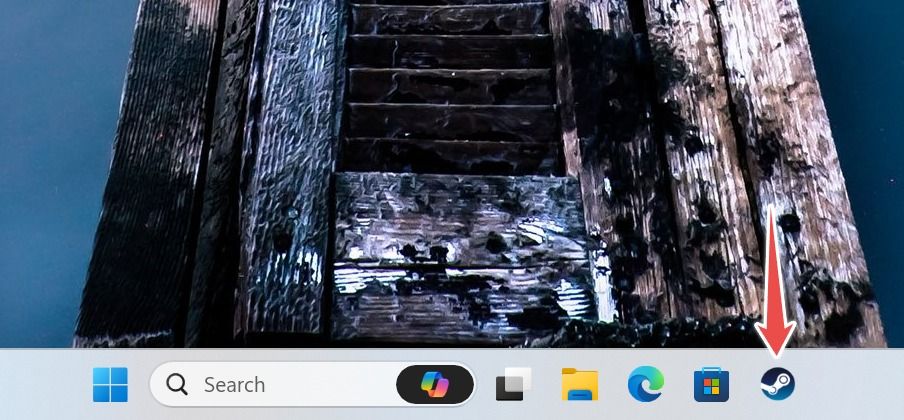 Windows 11 with the Steam app pinned to the Taskbar.