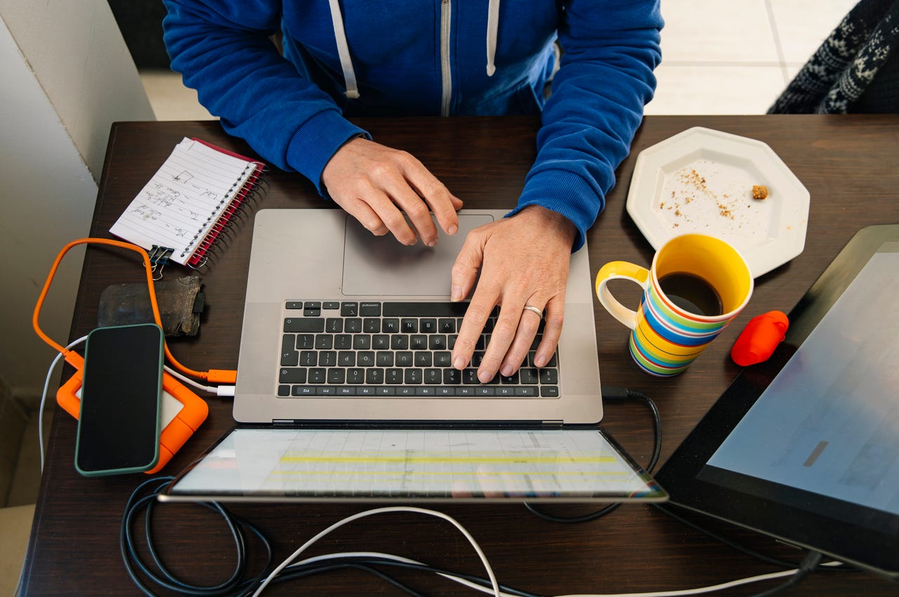 writer-on-laptop-gettyimages-1389914462