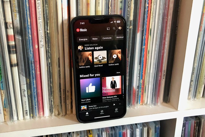 An iPhone with the YouTube Music app on it.