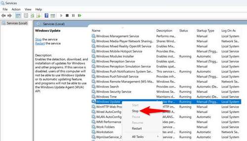 'Stop' highlighted for 'Windows Update' on the 'Services' window.