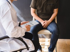 Male doctor and testicular cancer patient.