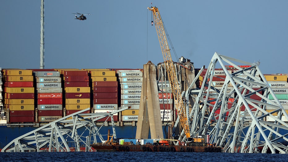 Cleaning up debris from the Francis Scott Key Bridge in Baltimore