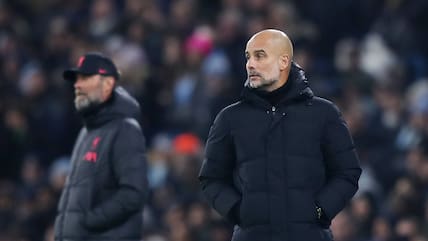 Für Jürgen Klopp (l.) und Pep Guardiola geht es um die englische Meisterschaft.