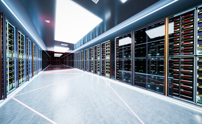 A data center room filled with servers.