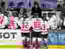 Canada head coach Troy Ryan, second left, gives directions to players with assistant coaches from left to right, Kori Cheverie, Caroline Ouellette and Courtney Kessel during their game against Switzerland at the IIHF Women's World Hockey Championship in Utica, N.Y., Friday, April 5, 2024.