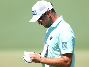 Corey Conners of Canada at the second green during the third round of the 2024 Masters Tournament at Augusta National Golf Club in Augusta, Ga., Saturday, April 13, 2024.