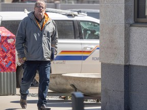 REGINA, SASK : April 11, 2024-- Michael Gordon Jackson who is charged with abduction in contravention of a parenting order, walks into the King's Bench Courthouse on Thursday, April 11, 2024 in Regina. KAYLE NEIS / Regina Leader-Post