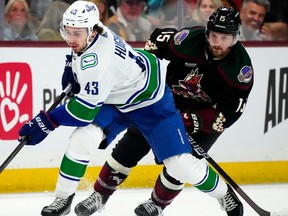 Arizona Coyotes centre Alex Kerfoot (15)