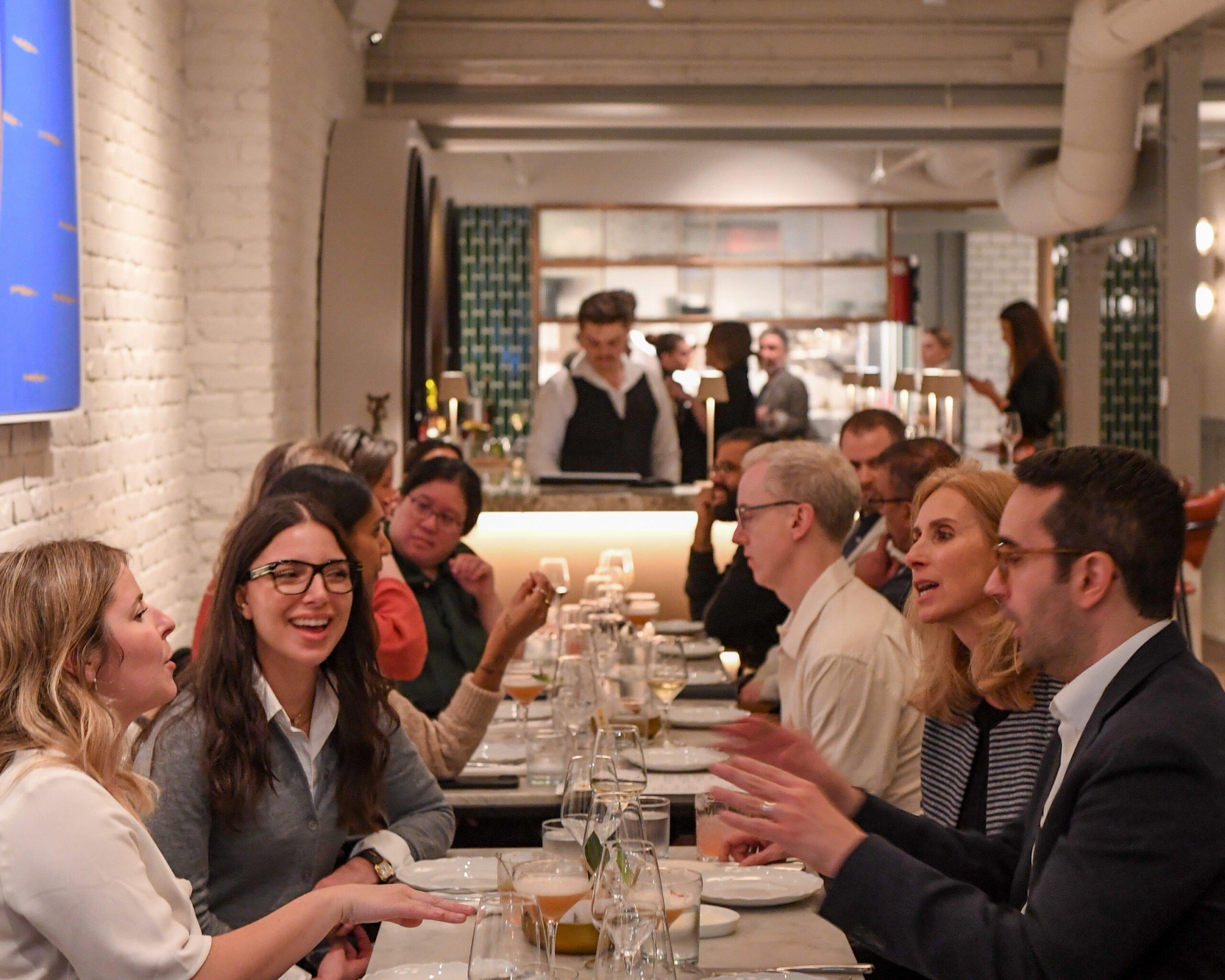 Guests in conversation at the Macleanâs Ideas Summit: Powerhouse Salon at Bar Ardo.