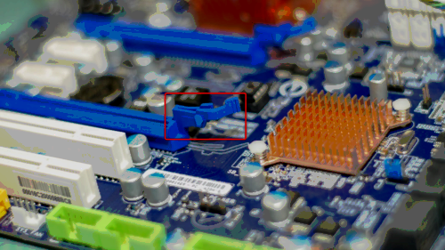 PCIe slots, PCI slots, and other electrical parts in a motherboard.