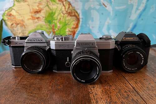 A selection of 35mm single lens reflex cameras.
