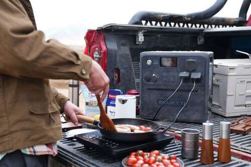 BLUETTI AC240 Powering Pan in Bed of Truck