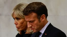 LONDON, ENGLAND - SEPTEMBER 18: French President Emmanuel Macron and his wife Brigitte Macron pay their respects  as they view the coffin of Queen Elizabeth II lying in state at Westminster Hall on September 18, 2022 in London, England. Members of the public are able to pay respects to Her Majesty Queen Elizabeth II for 23 hours a day from 17:00 on September 18, 2022 until 06:30 on September 19, 2022.  Queen Elizabeth II died at Balmoral Castle in Scotland on September 8, 2022, and is succeeded by her eldest son, King Charles III. (Photo by Sarah Meyssonnier-WPA Pool/Getty Images)