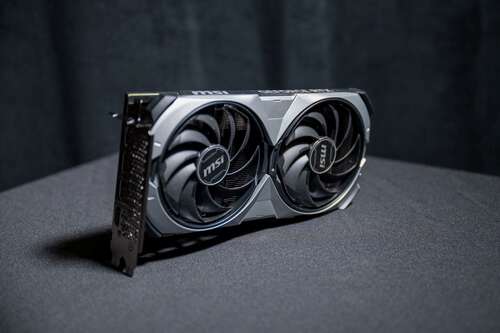 The MSI GeForce RTX 4070 Ti SUPER GPU sitting on a table.