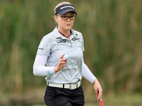 Brooke Henderson reacts on the 17th green during the third round of The Chevron Championship at The Club at Carlton Woods in The Woodlands, Texas, Saturday, April 20, 2024.