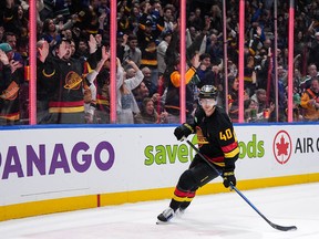 Elias Pettersson and Canucks fans at Rogers Arena