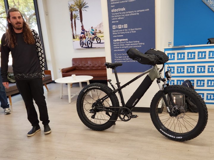 Lectric CEO and Co-Founder Levi Conlow with XPeak equipped with snow accessories including spiked tires.