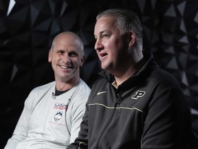 UConn head coach Dan Hurley and Purdue head coach Matt Painter talk during a CBS Sports interview ahead of a NCAA college Final Four championship basketball game, Sunday, April 7, 2024, in Glendale, Ariz.