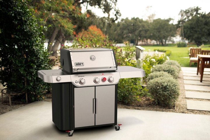 The Weber Genesis S-335 on a backyard patio.