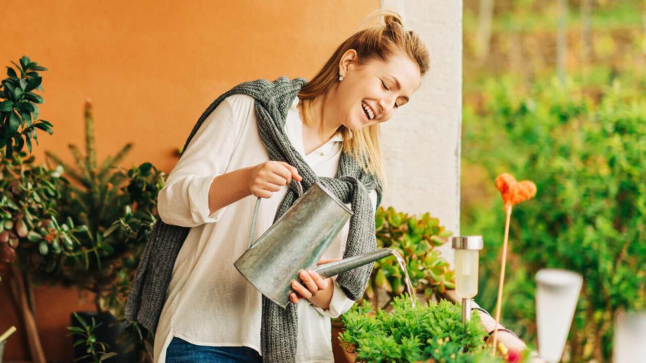 Woman watering plants