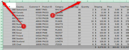 An Excel worksheet with all cells highlighted and an arrow pointing at the divide between two column headers where it is possible to change the column widths.