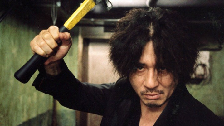 Choi Min-sik wielding a hammer in Oldboy.