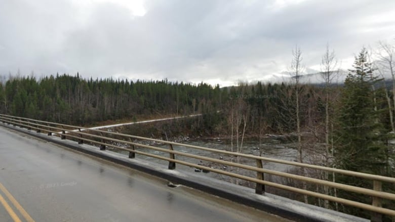 A highway bridge over a small river.