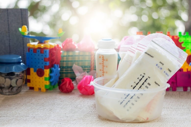 Breast milk frozen in storage bags for baby with sunlight