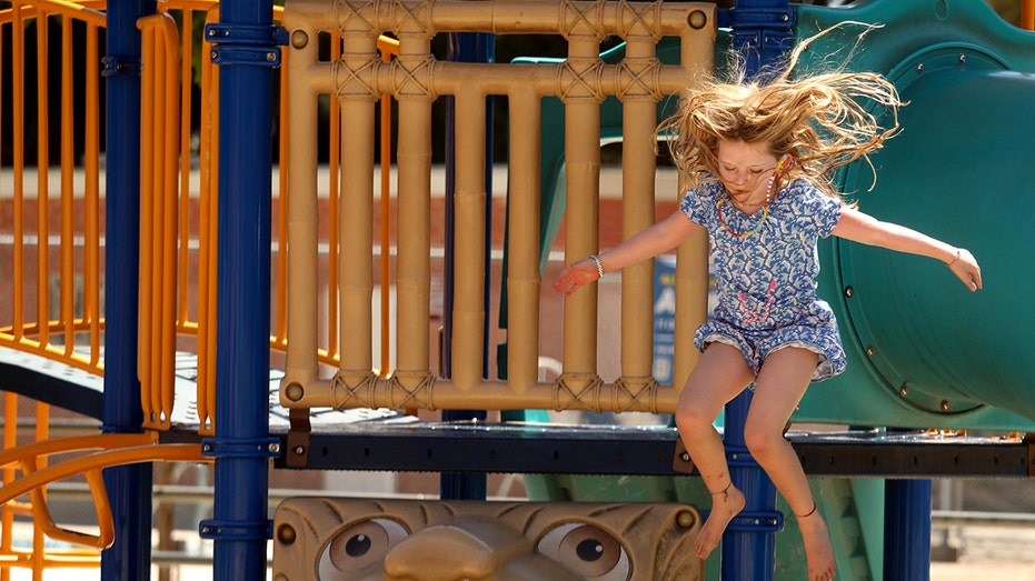 A child plays at a recreation center in Los Angeles