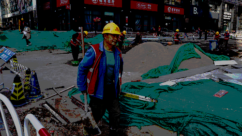 A worker labours at a construction site in Beijing.