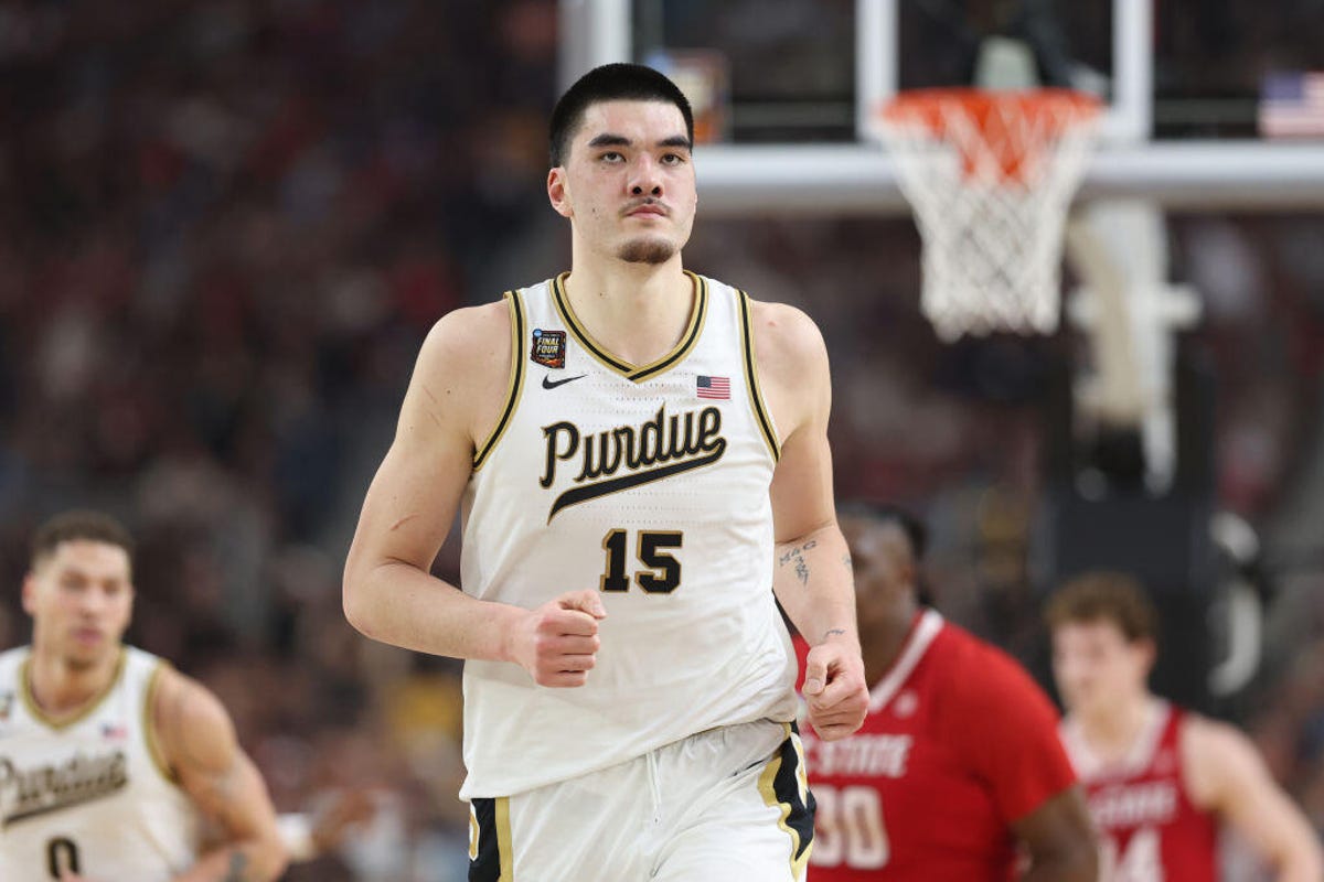 Center Zach Edey of Purdue jogs back down the court