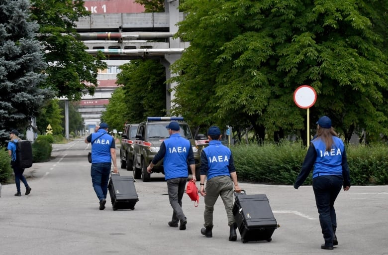 International Atomic Energy Agency inspectors are seen at the Zaporizhzhia nuclear power plant in southern Ukraine last month.