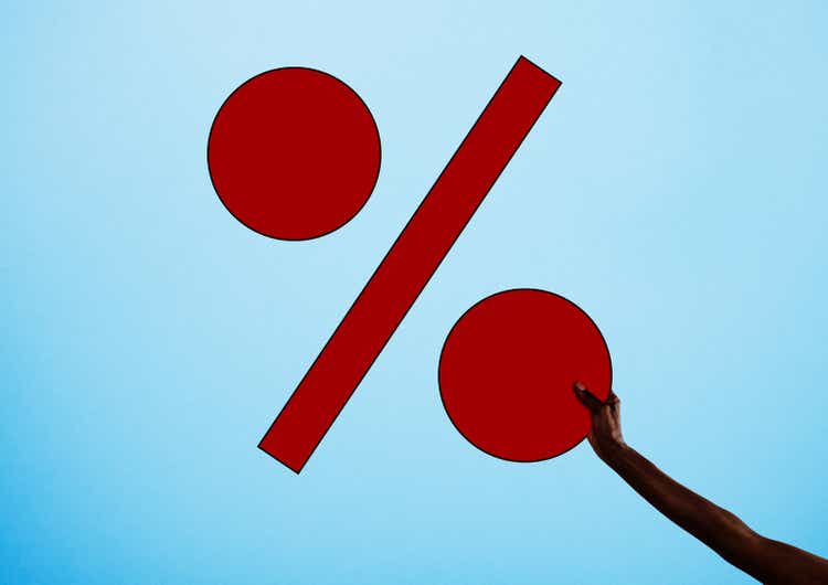 Woman holding percentage illustration