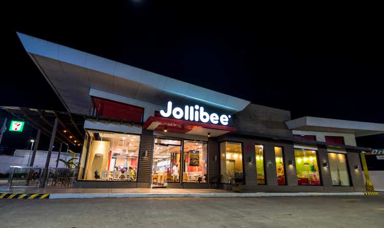 Palo, Leyte, Philippines - A Jollibee store during the evening. Jolibee is the most popular fastfood chain in the Philippines.