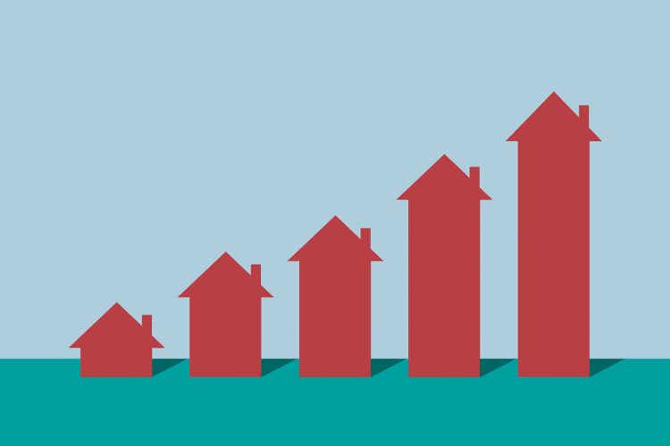 A rising bar graph made of house symbols