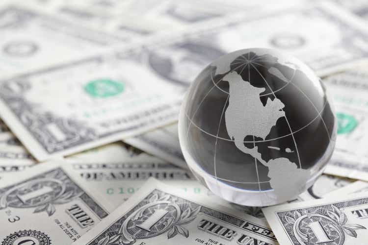 glass globe and money