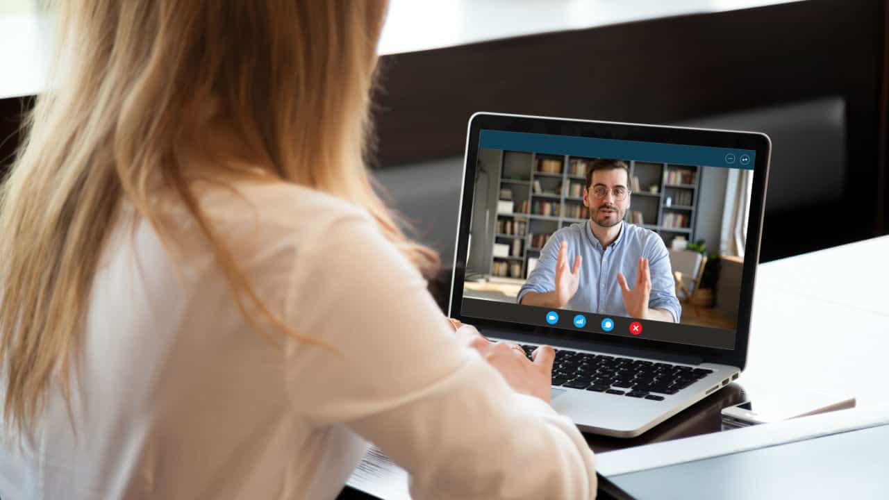 people talking online on laptop