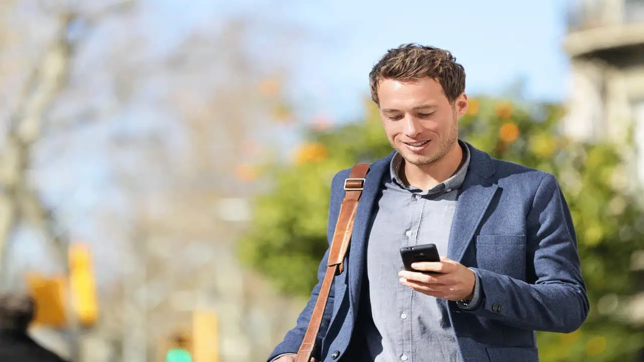 man-walking-on-phone