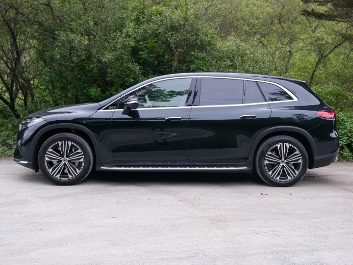 Side of the 2024 Mercedes-Benz EQS 450+ in front of trees